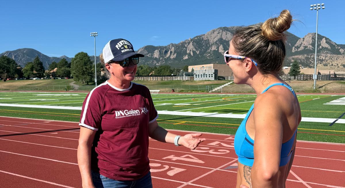 Kathy Butler coaching athlete Jessa 1:1 on the track in Boulder, Colorado